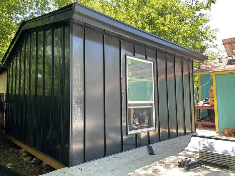 Black standing seam metal wall panels for Roof Inspection in Hempstead