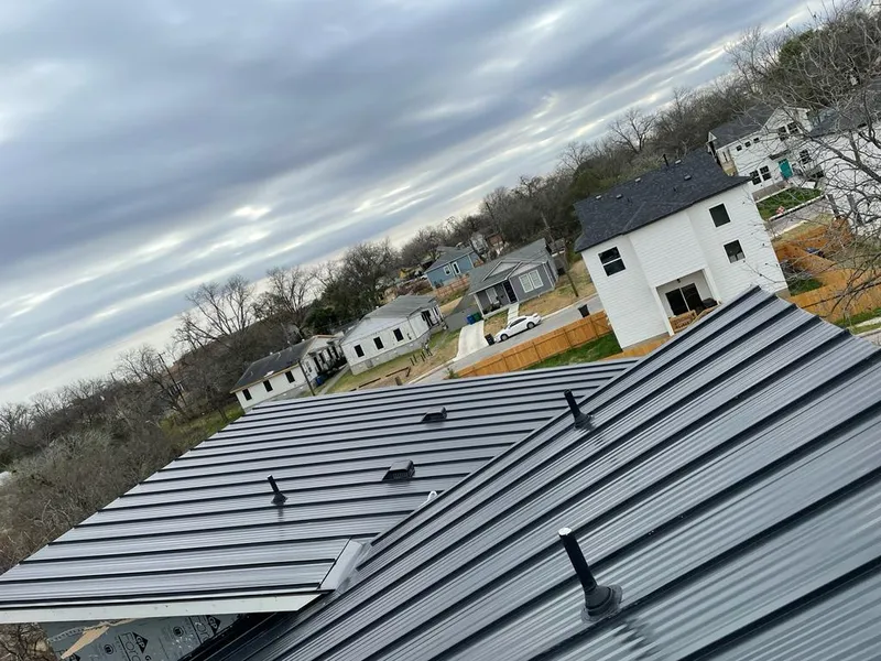 Standing seam metal roof panels with vents for Skylight Repair in Hempstead